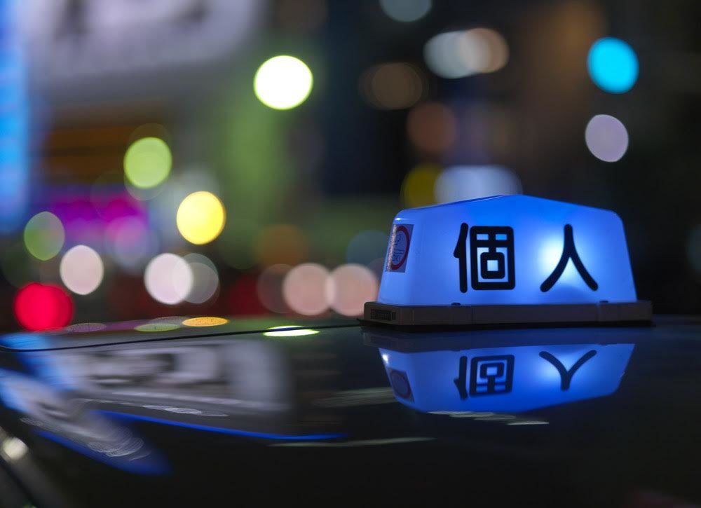 If you raise an arm in the neon-soaked streets of Tokyo, a taxi—or takushi—will begin a series of majestic manoeuvres.